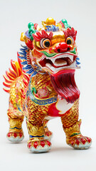 Fototapeta premium Colorful Chinese lion statue symbolizing prosperity and good fortune