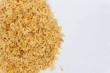 close up of Dried shrimp on a white background, a popular ingredient in Asian cuisine.