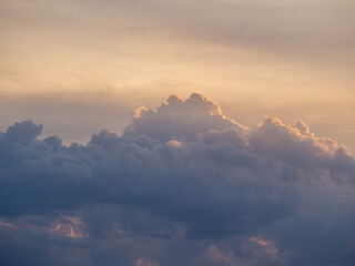 Sunset with dramatic clouds in the sky. Approaching storm clouds. Cloudy weather background