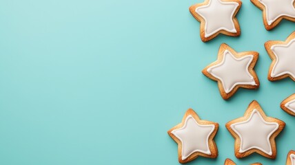 Star-shaped cookies with white icing on a mint green background, arranged playfully for a festive or celebratory occasion. - Powered by Adobe