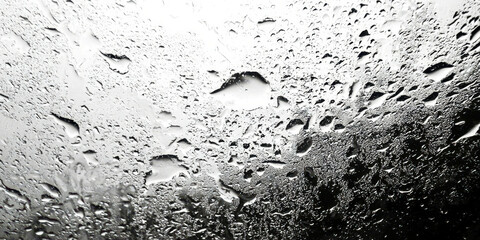 A blurry image of raindrops on a window