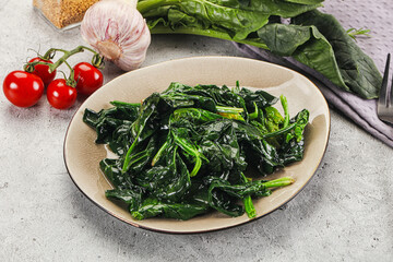 Coocked green spinach with oil
