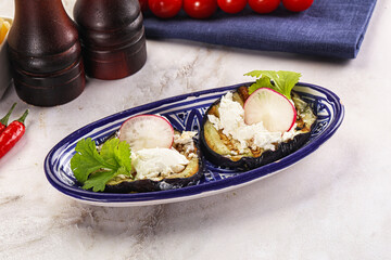 Grilled eggplant with cheese and radish
