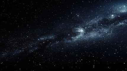 Obraz premium A stunning view of a galaxy filled with countless stars against a deep black cosmic canvas.