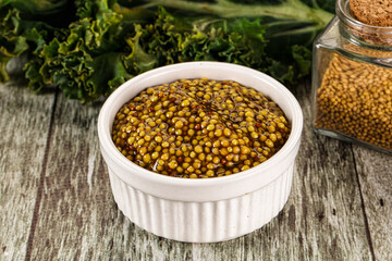 Mustard sauce with seeds in the bowl
