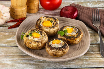 Baked champignon with quail egg