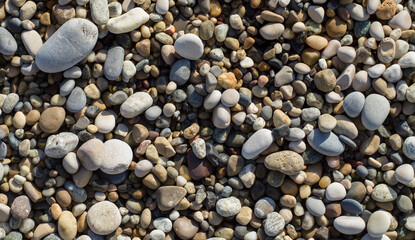 Smooth round sea stone, pebbles texture background, banner abstract 