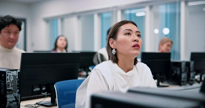 Japanese woman, students and computer science in lab for lesson, education and learning for degree. Group, people and classroom in university or college fro skill, language and scholarship in school