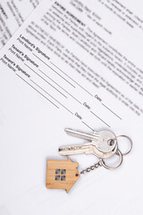 Rental or Residential Lease agreement contract and house keys. Short and long term rentals, housing searching crisis, signing lease agreement, and rising prices.