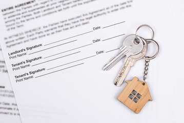 Rental or Residential Lease agreement contract and house keys. Short and long term rentals, housing searching crisis, signing lease agreement, and rising prices.