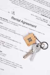 Rental or Residential Lease agreement contract and house keys. Short and long term rentals, housing searching crisis, signing lease agreement, and rising prices.