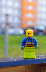 Naklejka premium Lego figurine on a rail