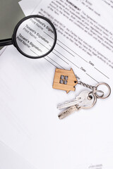Rental or Residential Lease agreement contract, magnifying glass, and house keys. Short and long term rentals, housing searching crisis, signing lease agreement, and rising prices.
