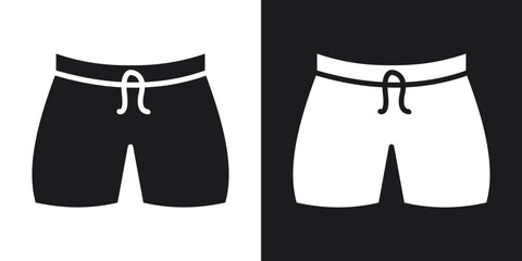 Swim shorts icon set in black filled and solid filled style