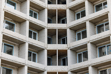 Balconies in Progress: A Building's Emerging Facade Showcasing Architectural Transformation Amidst Ongoing Construction.