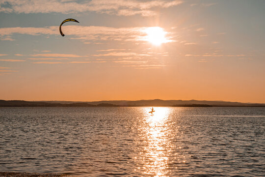 Walking on water holding a Kite.