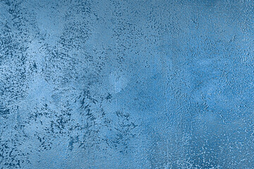 Texture of blue decorative plaster or concrete. Grunge background for design.