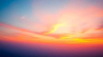 Fototapeta premium Serene Hues of a Sunset Sky with Delicate Cloud Formations