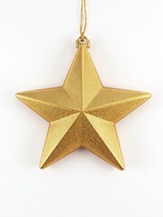 Fototapeta premium Christmas Star Ornament made of shiny gold metal with a slightly textured surface