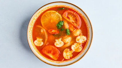 Tom Yum – A traditional Thai soup with a perfect balance of spicy, sour, and aromatic flavors. Made with lemongrass, kaffir lime leaves, galangal, and chili, often served with shrimp, mushrooms, and h