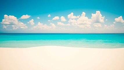 Obraz premium Azure Ocean Meets Pristine White Sand Beach With Fluffy Clouds Floating In A Clear Sky