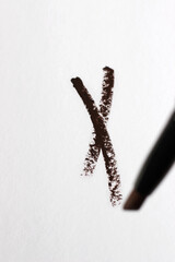 Swatch of Brown Eyeshadow in Stick on White Background. Beauty, Makeup.