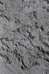 Béton gris texturé et crépi