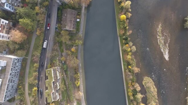 Aerial view of Swiss City of Z&uuml;rich with top view of traffic on road with Limmat River and Sihl River on an autumn morning. Movie shot November 18th, 2024, Zurich, Switzerland.
