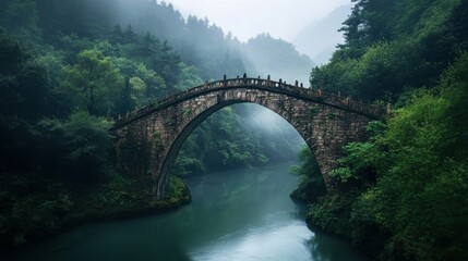 Fototapeta premium Ancient stone bridge over a flowing river, dense forest background, overcast sky, historic architecture, calm and serene, timeless and natural beauty