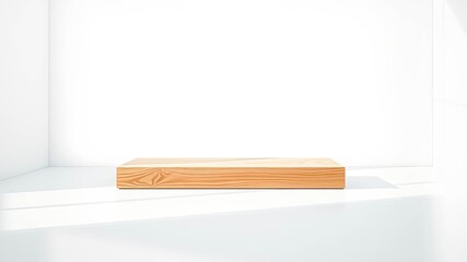 A simple wooden platform resting on a white floor with a touch of sunlight