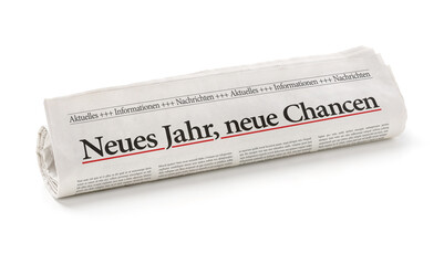 Zeitungsrolle mit der Überschrift Neues Jahr, neue Chancen