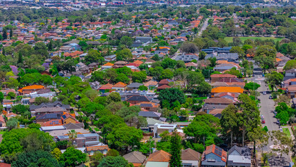 Panoramic aerial drone view of western Sydney Suburbs of Canterbury Burwood Ashfield Marrickville Campsie with Houses roads and parks in Sydney New South Wales NSW Australia