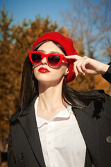 female in red beret