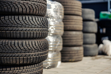 Close up of tires at mechanic workshop yard.