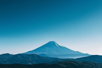 Fototapeta premium Majestic View of Mount Fuji Under a Serene Blue Sky