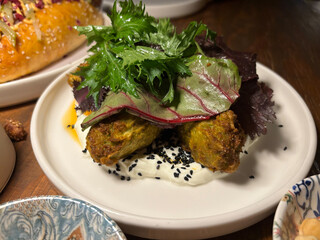 Pea Mucver Turkish traditional food served at restaurant.