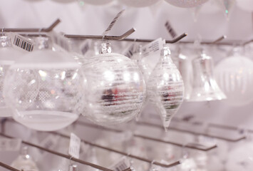 Christmas Tree Ornaments Hanging for Sale in Store Display