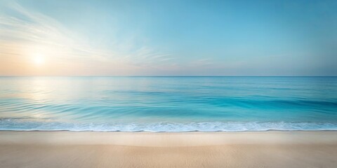Fototapeta premium Serene coastal scene at sunrise, featuring tranquil ocean waves gently lapping a sandy shore under a clear sky.