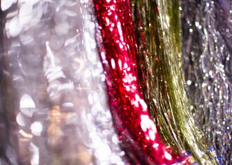 Background of White, Red, Gold, and Silver Christmas Tinsel