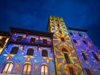 Beautiful christmas video projections in the old palace of the main square of Arezzo in Tuscany, Italy