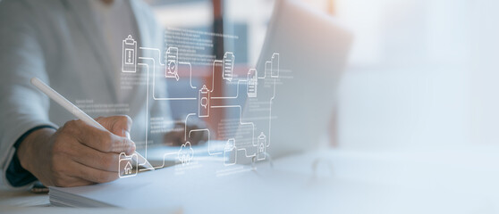 businessman on document planning the business plans and analyse  profitability of working companies...