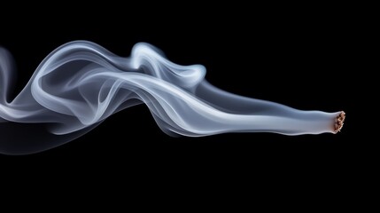 Obraz premium Delicate wisps of smoke curling elegantly against a dark background from an extinguished cigarette