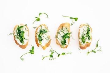 Sandwiches with fresh sprouting microgreens. Sprouted peas seeds micro greens. Vegan food