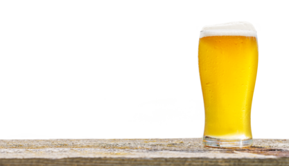 A glass of cold beer placed on a table