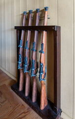 Rifles in a Wooden Stand