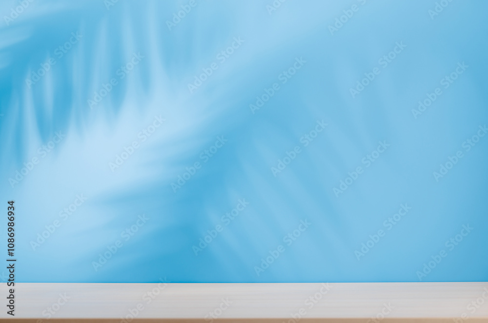Aufkleber template with empty table and wall with natural plant shadow and sunny glare
