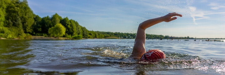 Swimming in a lake panorama
