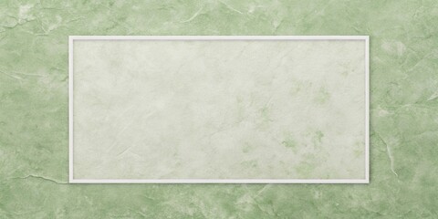 Elegant white frame on a textured sage green wall background perfect for your design projects