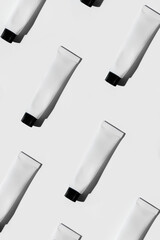 White cream mockup on delicate background pattern. cosmetics design.