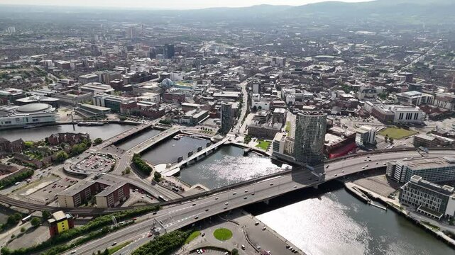 Drone footage of Belfast's bustling city center in Northern Ireland, UK